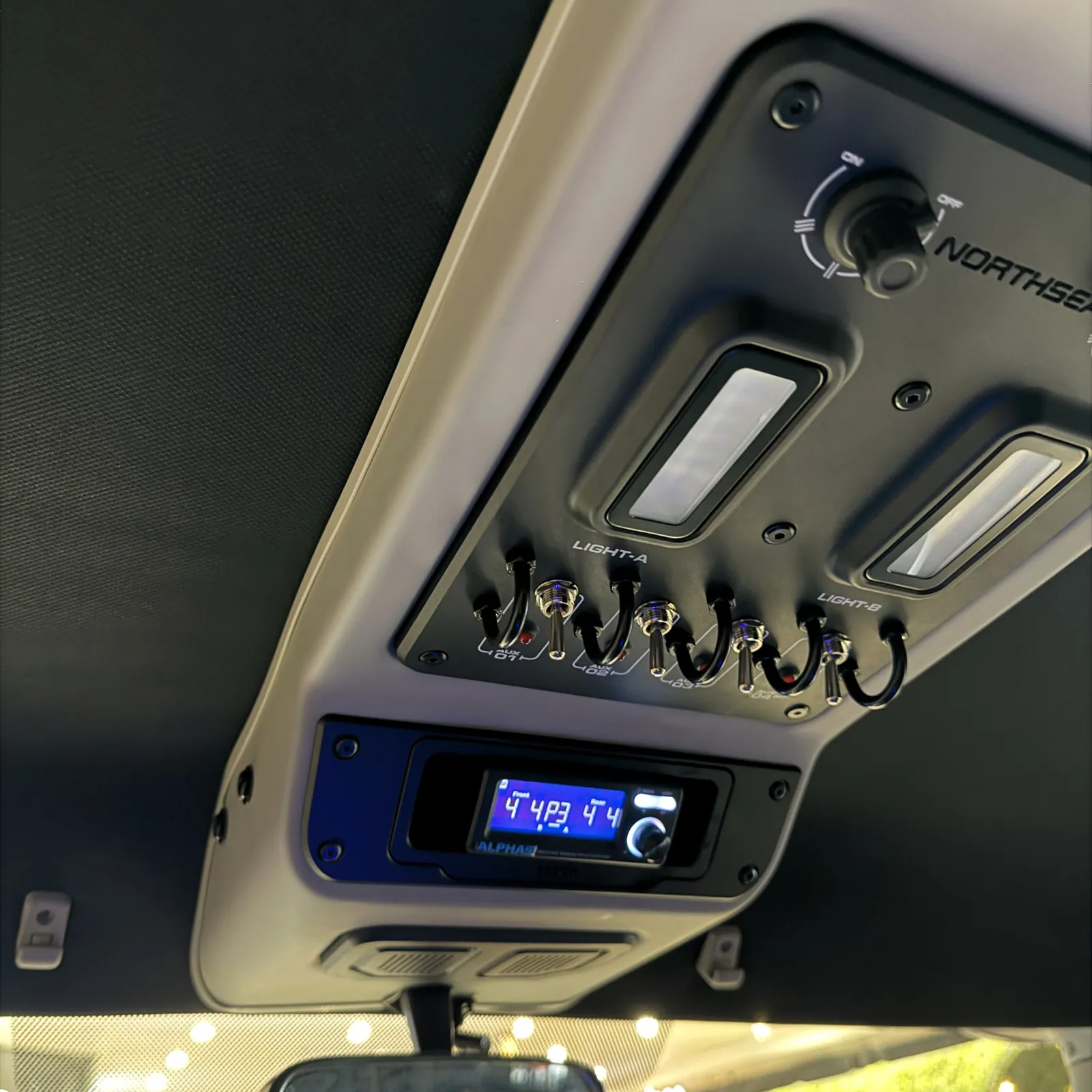 Urnieta roof console with switch panel and Alpha damping controller in a Land Cruiser 79