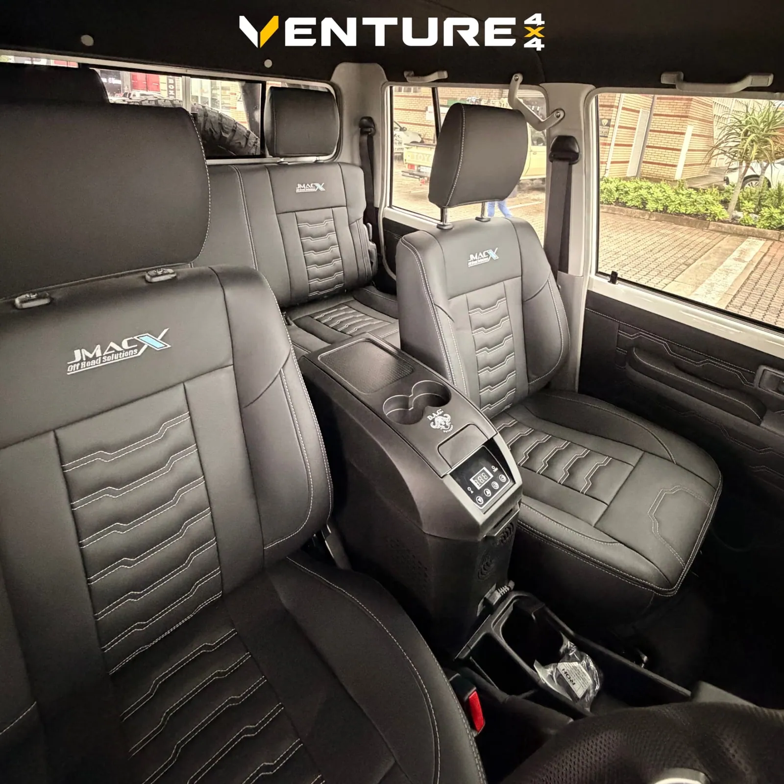 Full JMACX leather interior with centre console fridge