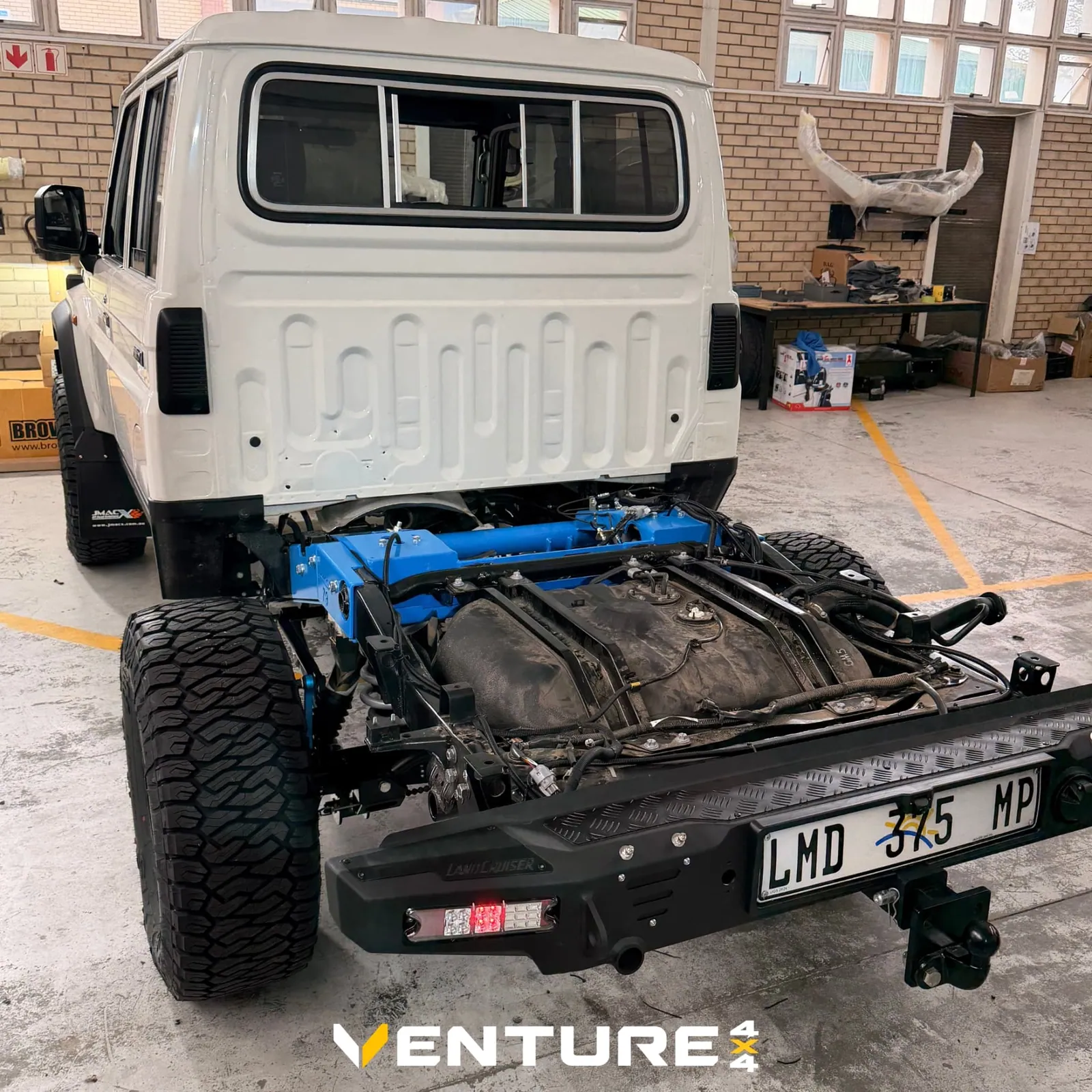 Chassis and long-range tank work in progress in the fitment bay