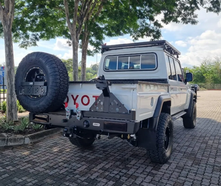 Gobi-X rear bumper with spare-wheel carrier and Front Runner roof rack — Foxtrot Cruiser — Onca & Gobi-X Land Cruiser 79, fitted by Venture 4x4 in Nelspruit