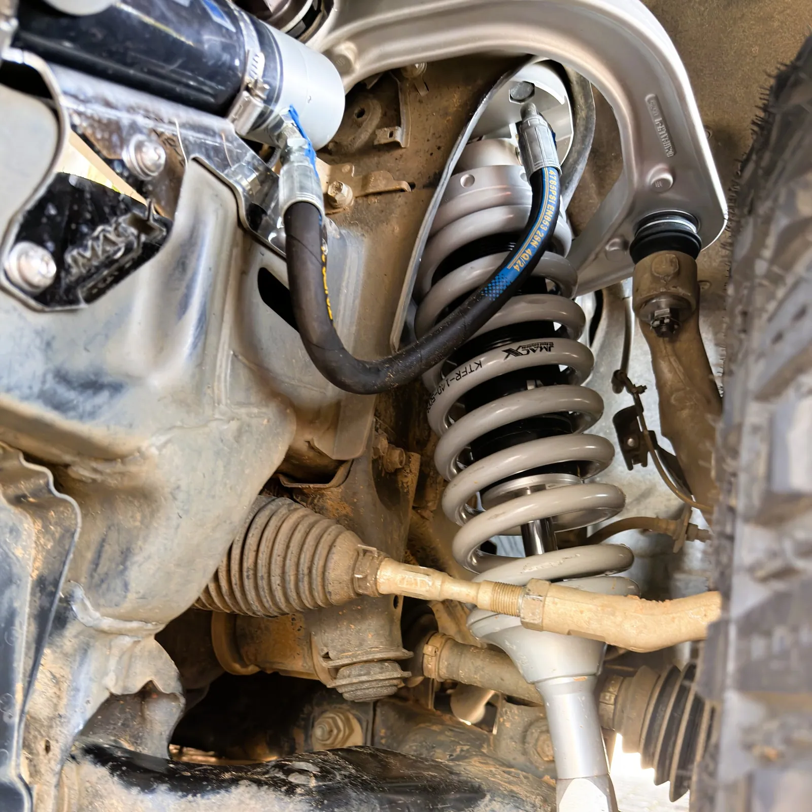 JMACX Alpha shock and electrical adjustable suspension — front