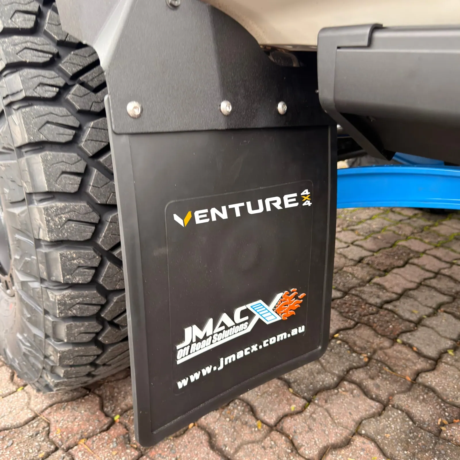 Venture 4x4 and JMACX mudflap detail — King Cruiser — JMACX Coil-Converted Land Cruiser 79, fitted by Venture 4x4 in Nelspruit